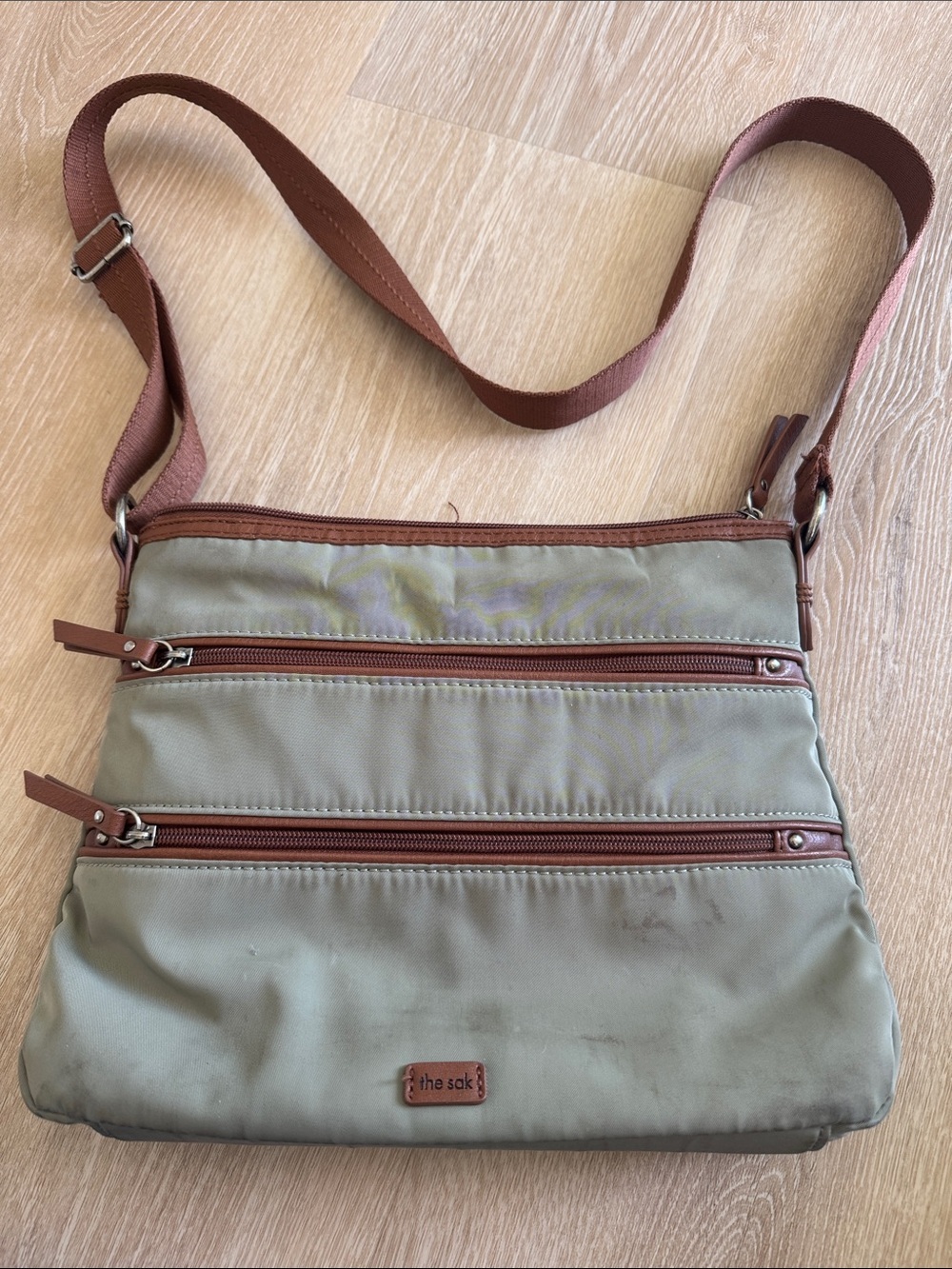 The Sak Olive Green Crossbody with Brown Trim and Strap